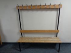 A ten hook cloakroom coat stand with bench, 160 cm high x 150 cm wide x 39.5 cm deep.