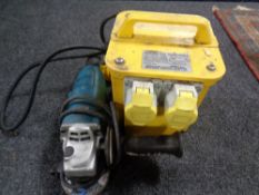 A Makita 110 V angle grinder together with a 110 V transformer