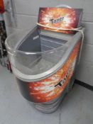 A Caravell commercial chiller bearing Tango advertisement
