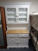 A painted farmhouse kitchen dresser