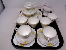 A tray containing a 21 piece bone china tea service together with a further Royal Albert bone china