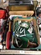 A box containing playing cards, cased backgammon,