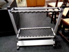 A twin sided 24 space fishing rod stand