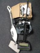 A G Tech upright vacuum together with a G Tech hand held vacuum with tools,