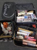 Three luggage cases and a box containing miscellaneous books, wallpaper, ornaments,