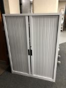 A metal office shutter cabinet
