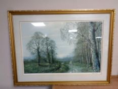 A Caesar Smith signed limited edition print depicting huntsmen on horses and hounds in a wooded
