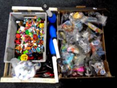 Two boxes containing McDonald's toys, juggling batons,