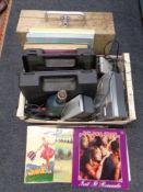 A crate containing two electric drills, LPs and LP box sets, a Panasonic micro hifi system,