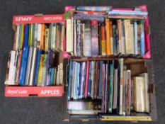 Three boxes containing hardback and softback books relating to railway,