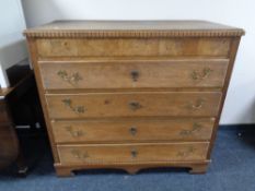 A 19th century continental oak five drawer chest on bracket feet