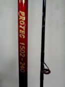A Shakespeare Protec 1502 two piece carp rod together with Shimano bait runner 5000 RE reel
