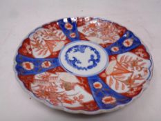 An Imari scalloped edged plate,