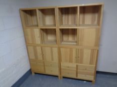 A four piece contemporary modular cube unit with drawers beneath