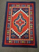 A woolen rug of geometric design