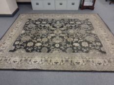 A machine made Persian design carpet on black ground