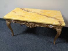 A French style gilt coffee table with marble effect top