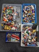 Four crates of a large quantity of assorted Lego and other building blocks