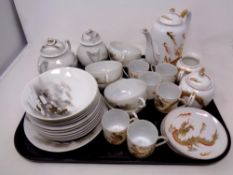 A tray of two Japanese eggshell tea services