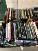 Two boxes containing books relating to trains and railways