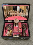 A lacquered jewellery box containing costume jewellery, rock pendant,