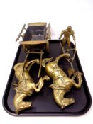 A heavy brass horse-drawn cart together with a brass horse-drawn plow.