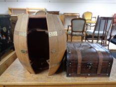 A wall mounted cocktail cabinet in the form of a barrel together with a contemporary leather bound