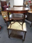 A 20th century mahogany circular two tier occasional table together with an oak barley twist two