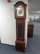 A Tempus Fugit longcase clock with pendulum and weights