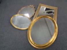 Four gilt framed mirrors