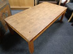 A rectangular pine coffee table