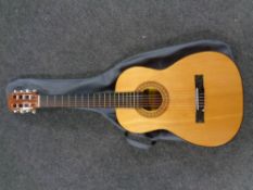 A Lauren model LA-50M acoustic guitar in carry bag