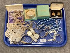 A tray of costume jewellery,