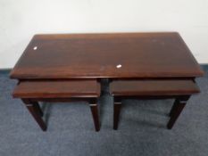 A nest of three Stag Minstrel tables