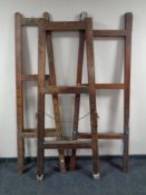 Three early twentieth century folding pine A-frames,