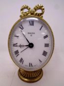 A Swiza 8 brass desk clock