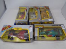 Five Burago 1:24 scale die cast racing cars - Ferrari C64 turbo, Monza Grand Prix,