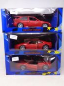 Three UT Models 1:18 die cast cars - Ford Escort Cosworth,