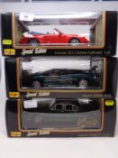 Three Maisto 1:18 Special Edition die cast vehicles - Porsche 911 Carrera Cabriolet,
