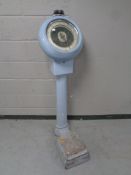 A set of early twentieth century enamel coin operated scales