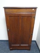 An Edwardian oak hall cabinet