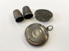 Two antique silver thimbles, a compact and a box.