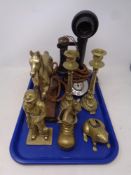 An early twentieth century candlestick telephone together with assorted brass ware,
