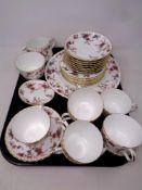 Twenty eight pieces of Minton bone tea china