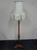 A 19th century brass inlaid rosewood pole screen stand converted to a standard lamp