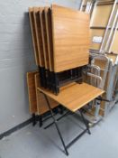 Eight folding metal tables with wood effect tops