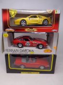 Three 1:18 scale die cast vehicles to include Majorette Club Ferrari,