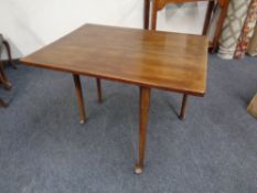 A nineteenth century mahogany drop leaf table on club feet
