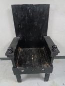 A rustic throne chair