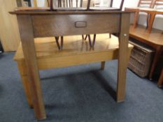 An early twentieth century oak fire surround